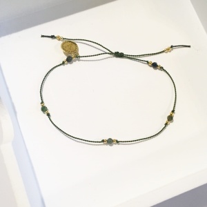 Bransoletka Naturalność  z zielonych turmalinów na zielonym sznureczki złoto